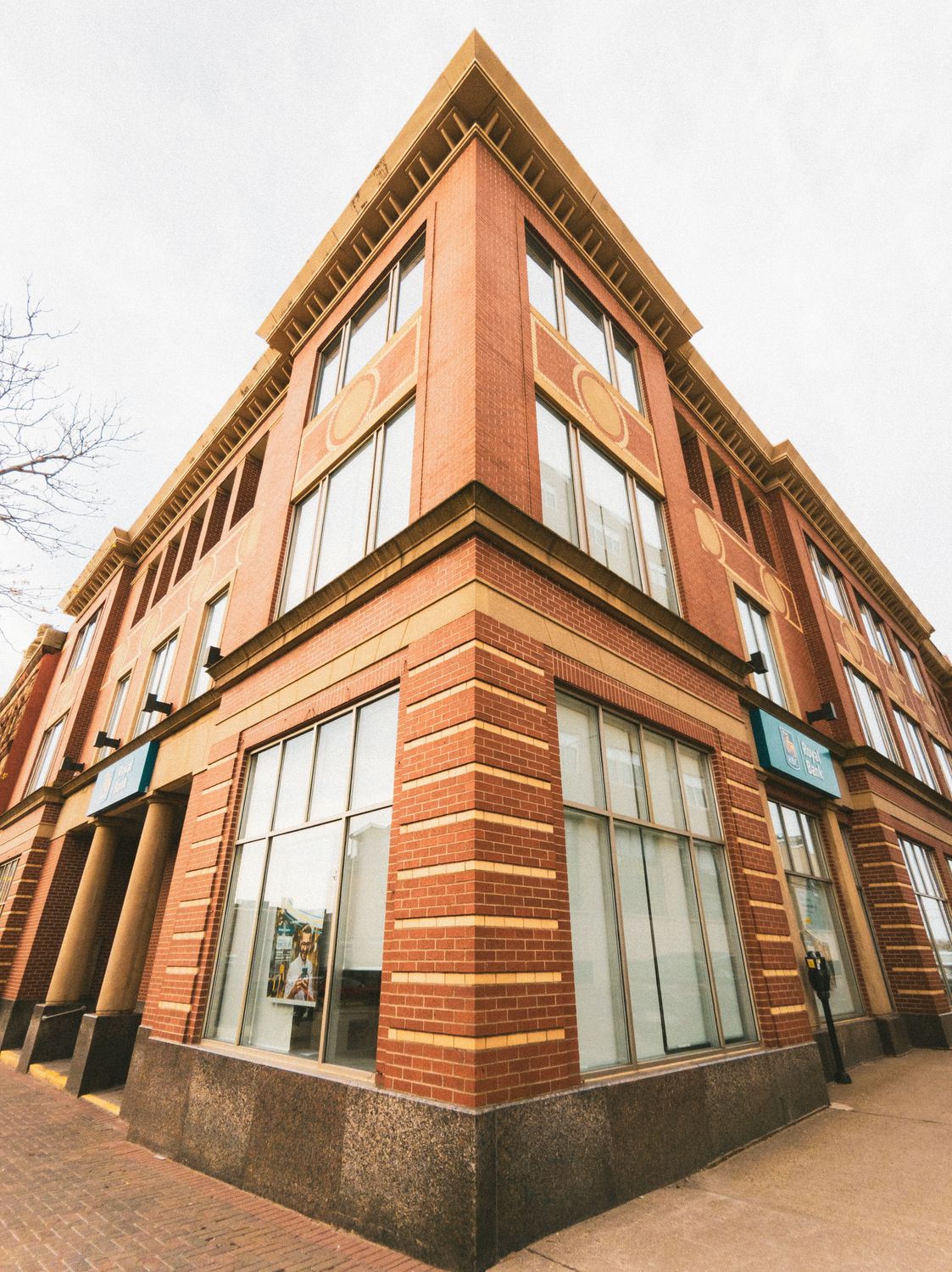 Corner of Brick Building in Town ยท Free Stock Photo