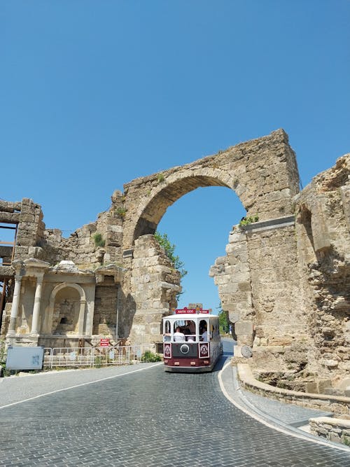 Tourists in Wagon Exploring Ruins in Side, Turkey