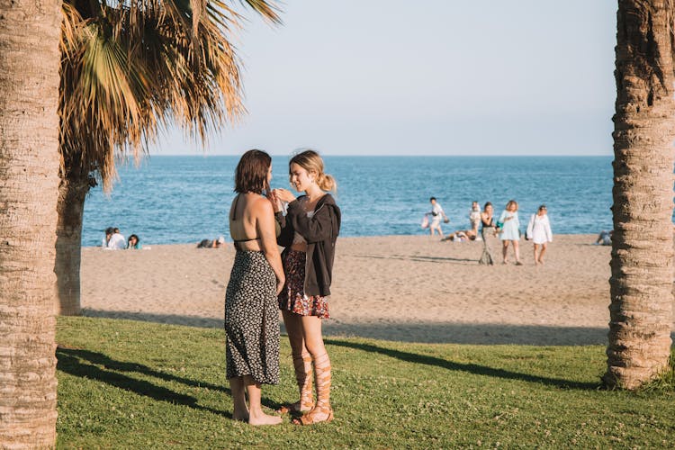 People On Sunlit Beach