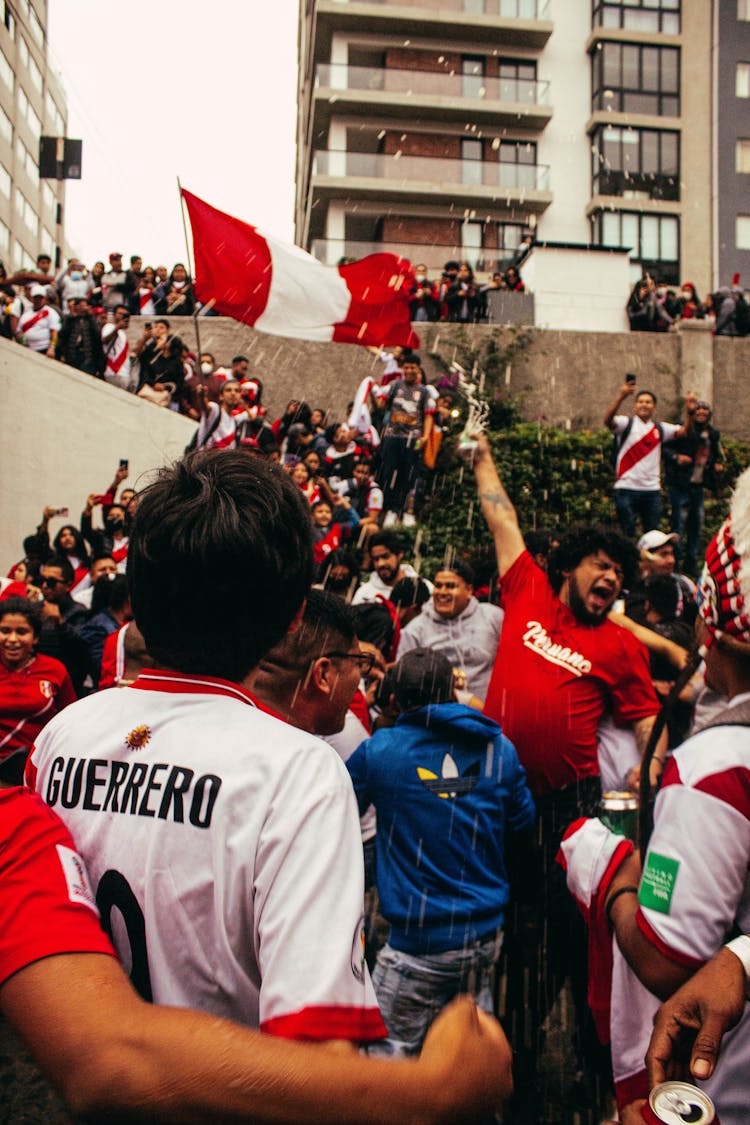 Football Fans Celebrating On City Street