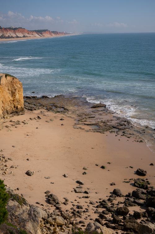 Free Explore the stunning coastline of Albufeira, Portugal, with its sandy beaches and dramatic cliffs under a clear sky. Stock Photo