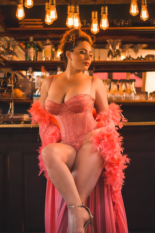 Woman in Red Lingerie Poses in Bar