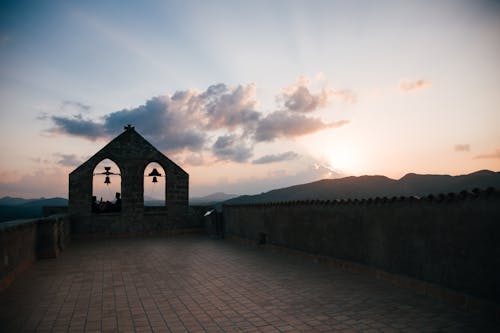 Gray Concrete Building during Sunset