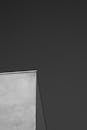 Black and White Minimalist Shot of A Building Top Corner