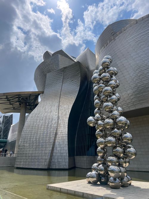 Free Stunning view of the Guggenheim Museum Bilbao's exterior with iconic sculpture. Stock Photo