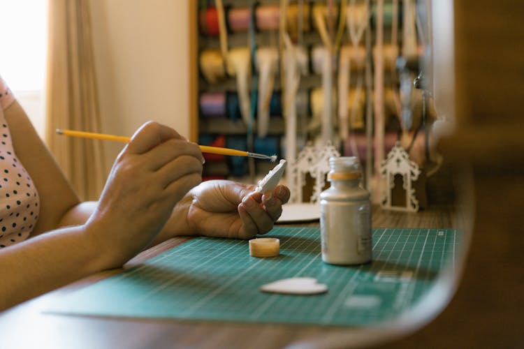 Hands Of Woman Working On Table