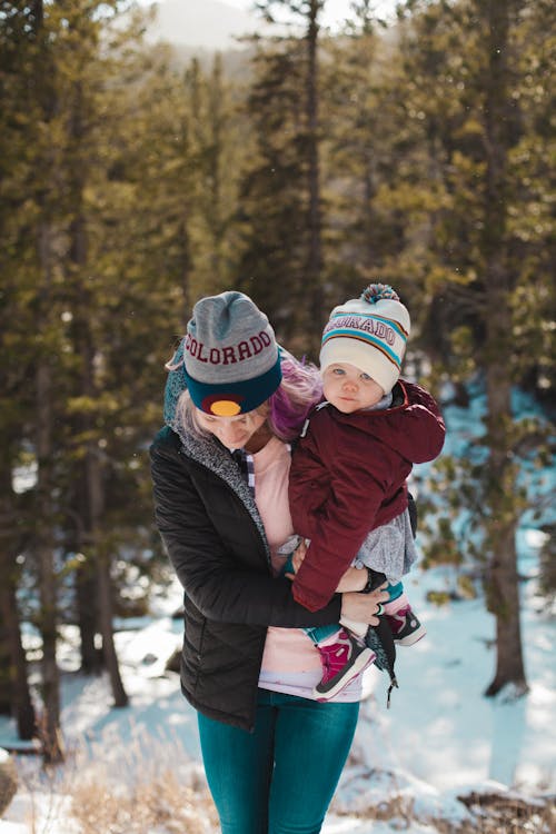 Free Woman Carrying Baby  Stock Photo