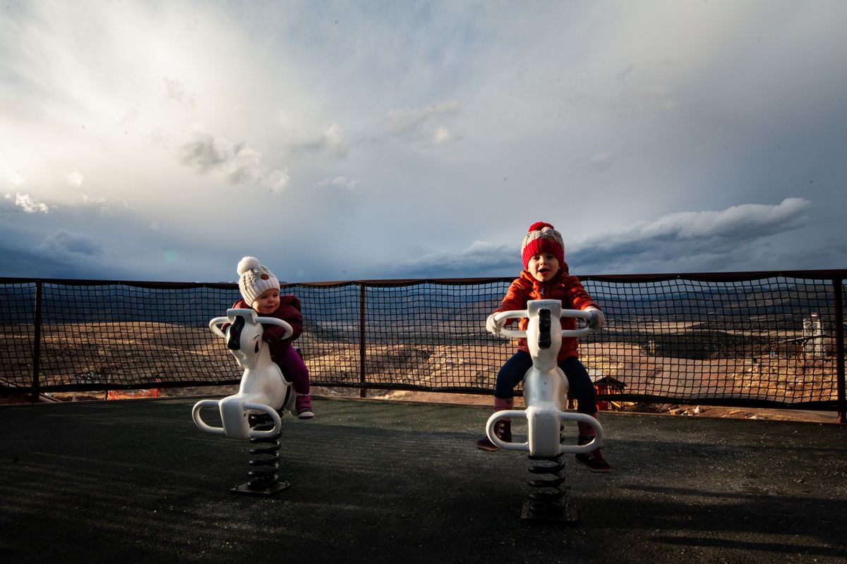 Kids on a playground obstacle play area