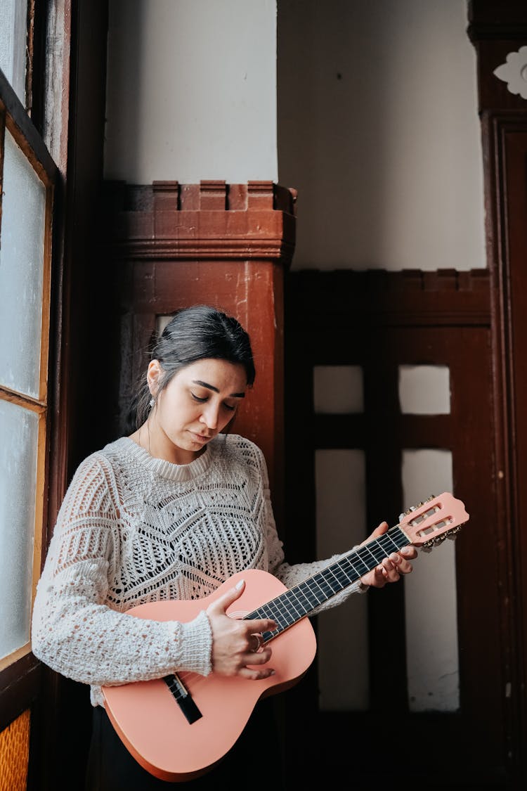 Woman Playing Guitar