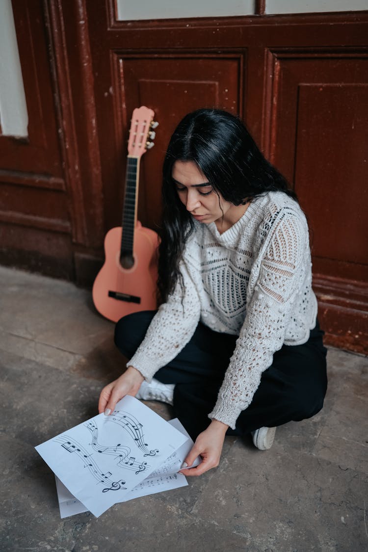 Woman Reading Music Scores