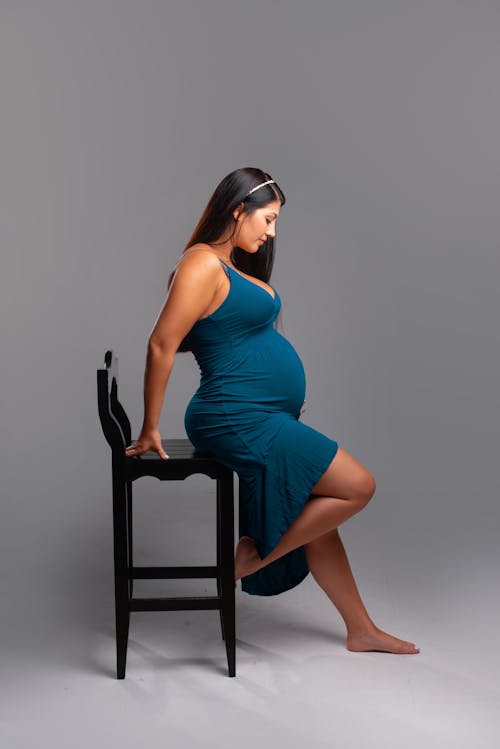 Pregnant Woman Posing in Studio 