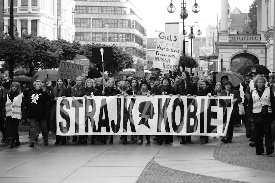 Black and white photo of a women's rights protest in Wrocław, Poland.