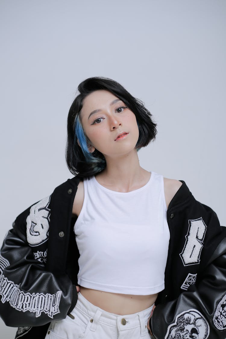 Woman Posing In Letterman Jacket