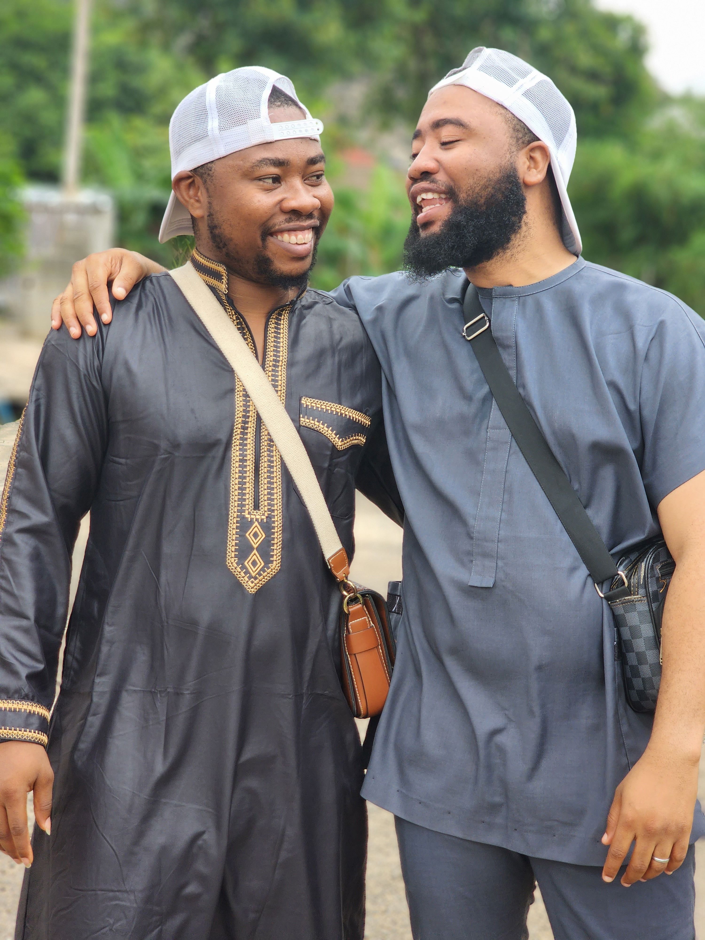 Men Posing in Shirt and Traditional Clothing · Free Stock Photo