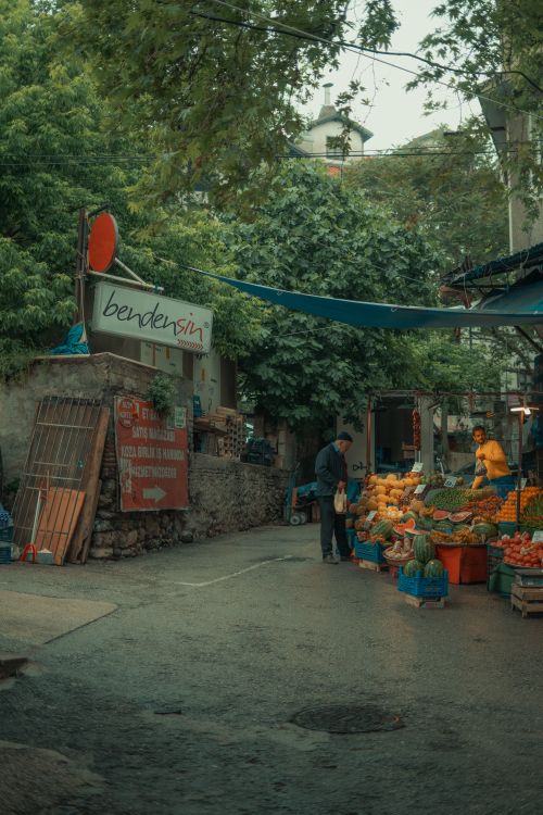 Free Vibrant scene of a street market in Bursa, Turkey, showcasing fresh fruits and urban life. Stock Photo