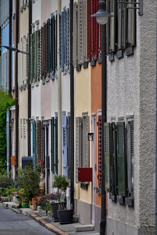 Colorful Shutters on a Facade of a Building