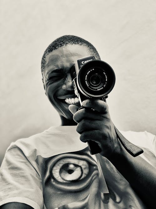 Smiling Person with Camera