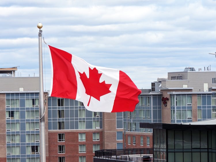 Canadian Flag On A Flagpole 