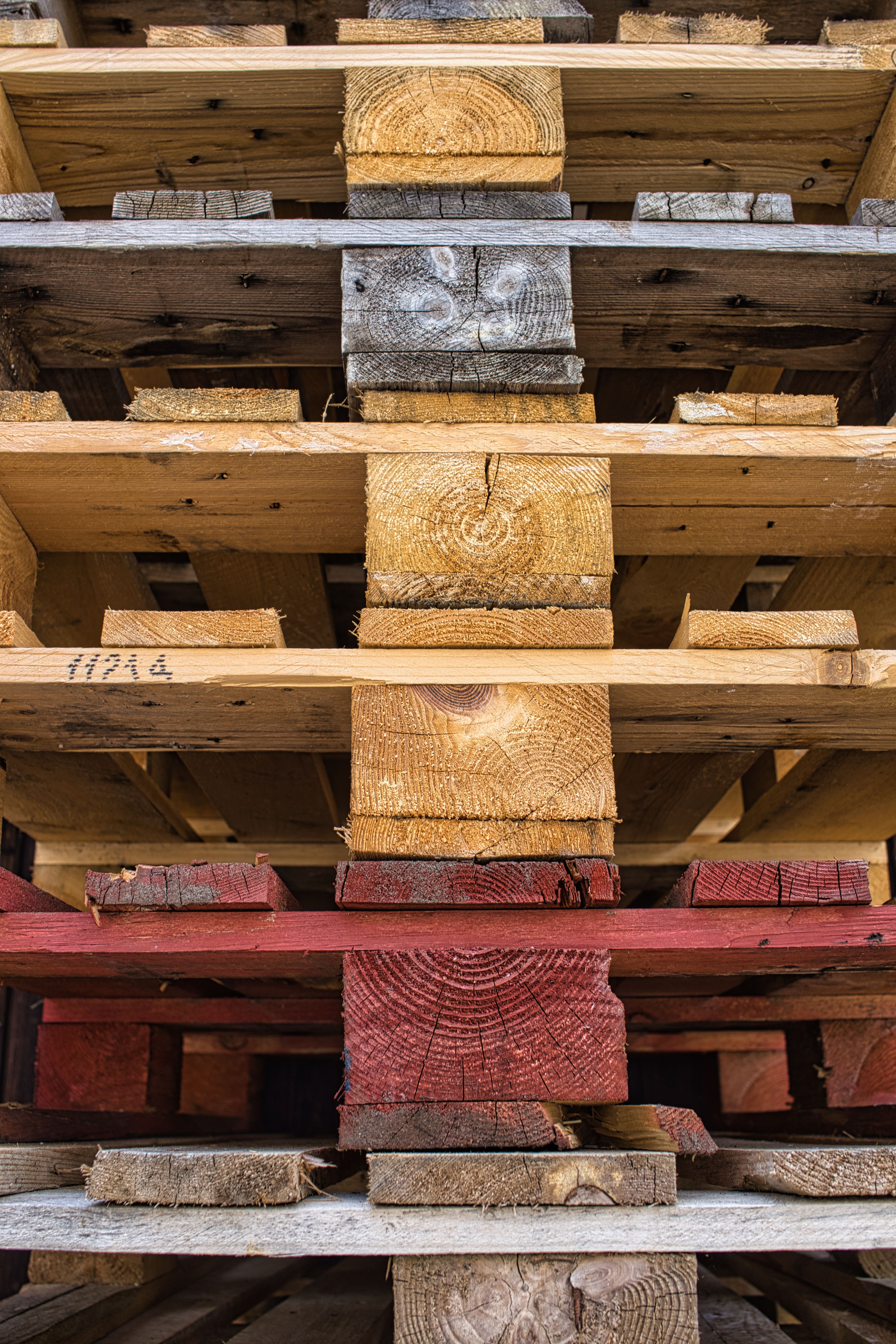 Wood pallets stacked for removal or recycling