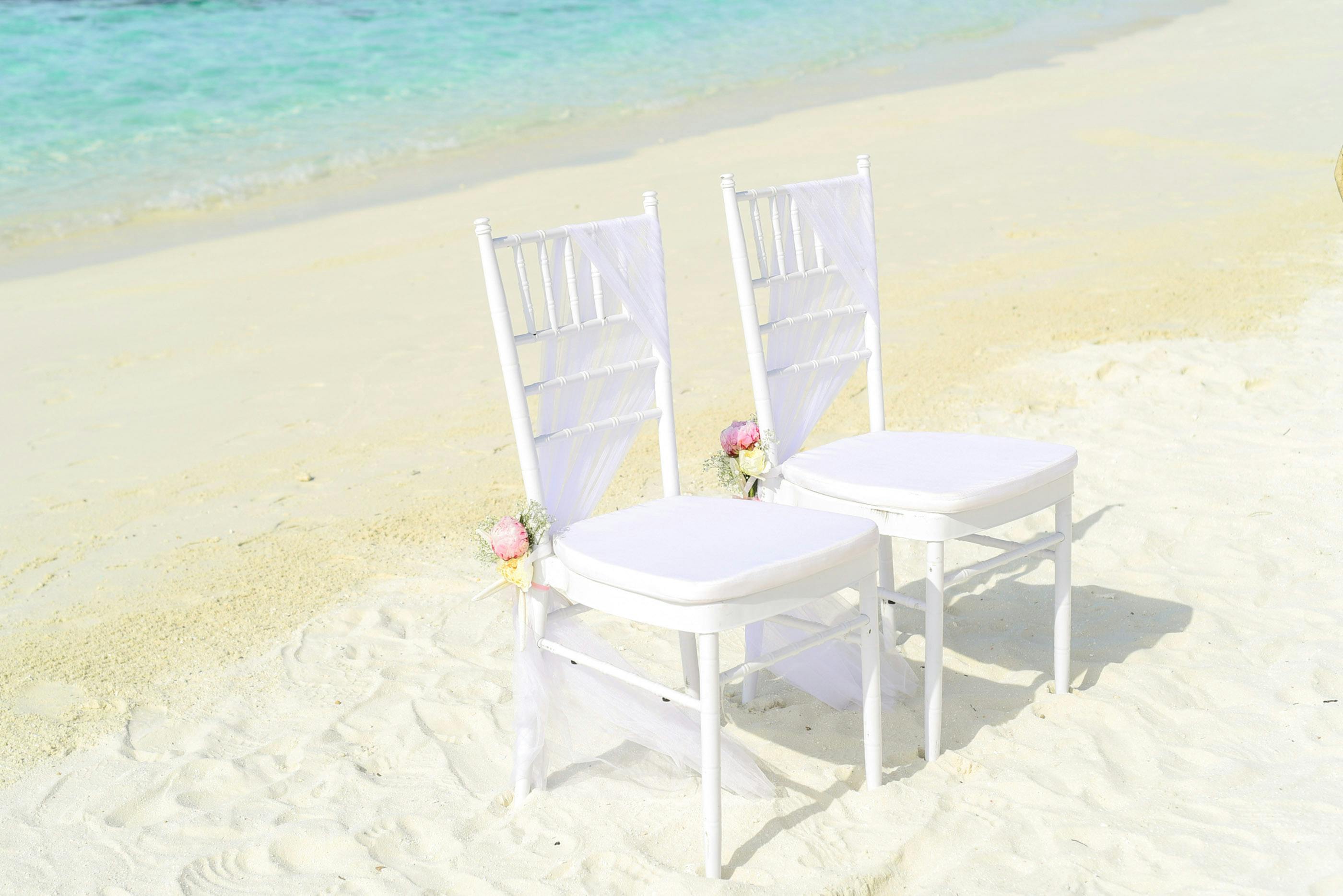 Two White Armless Chairs on Seashore · Free Stock Photo