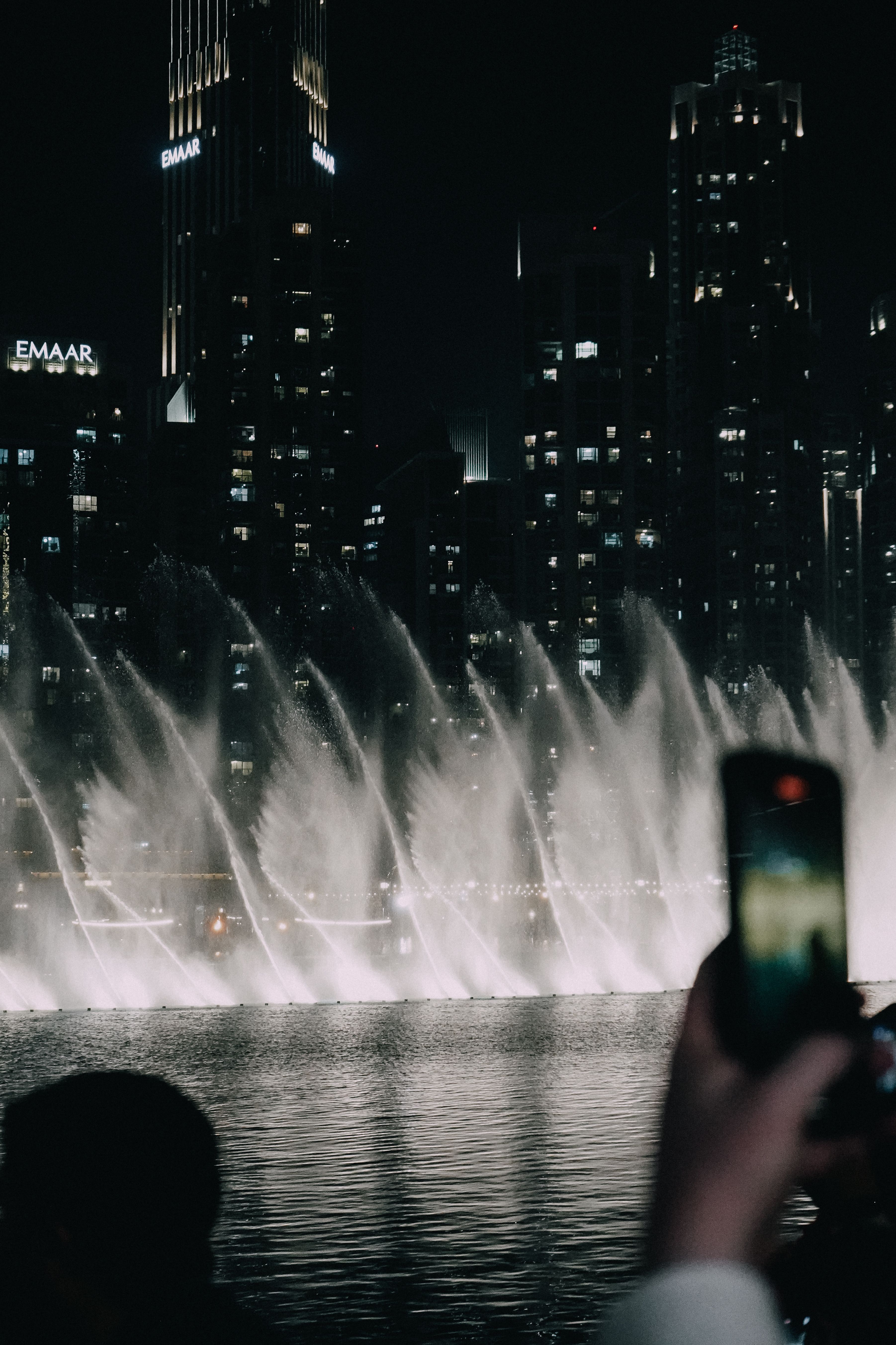 Fountain and Buildings in City at Night · Free Stock Photo