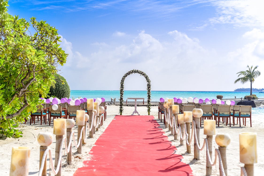 Free Beach Wedding Event Under White Clouds and Clear Sky during Daytime Stock Photo