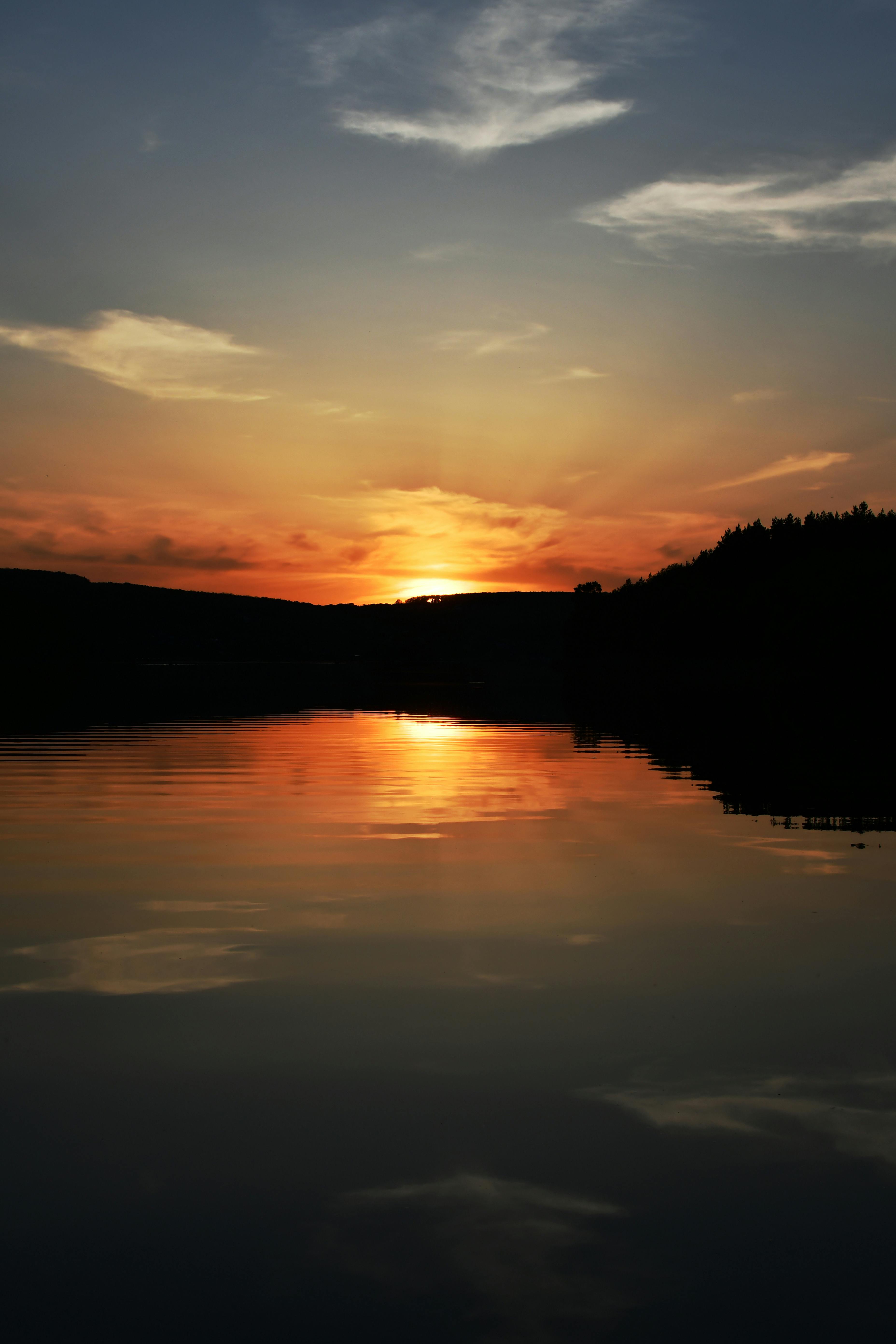 Sunset at dusk on the lake cheapest