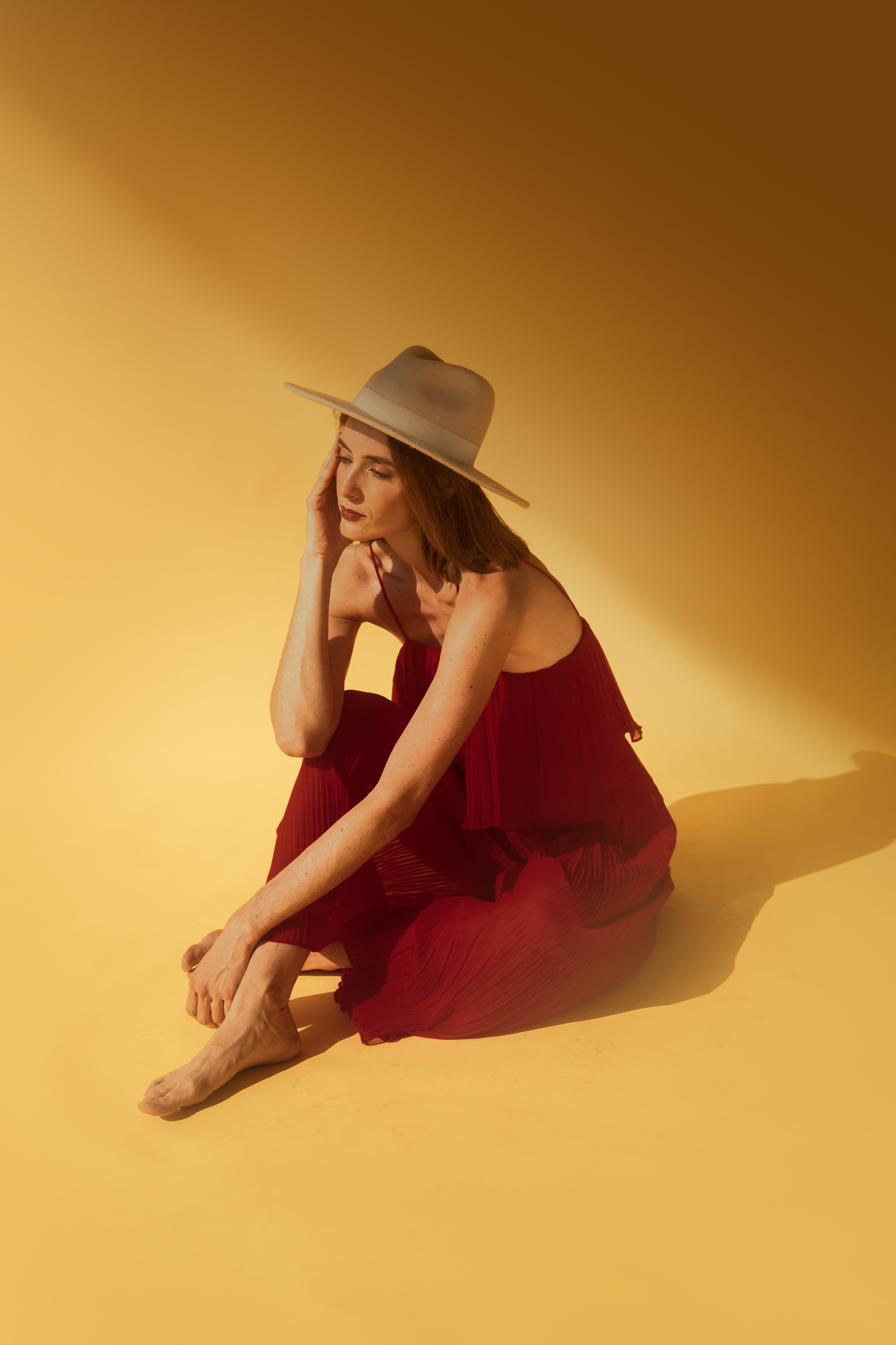 Beautiful Woman in Hat and Red Dress Posing in Yellow Studio · Free ...