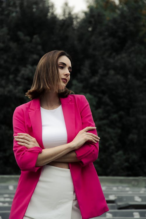 Brunette Woman in Pink Jacket and White Top