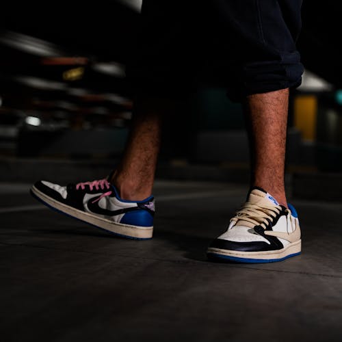 Close-up of a Man Wearing the Jordan 1 Low Travis Scott x Fragment Sneakers 