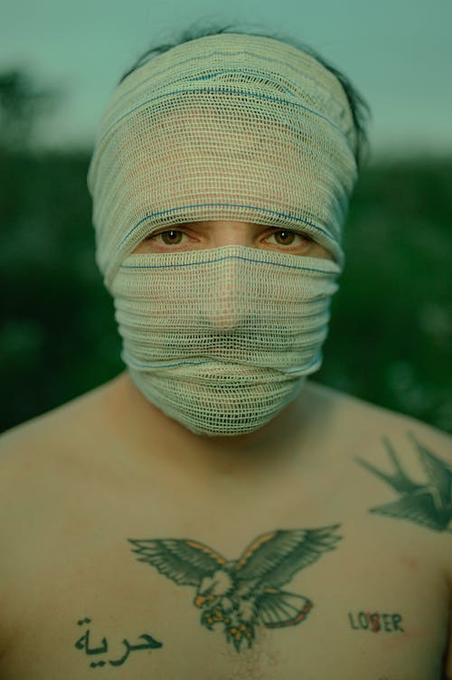 Free Gauze Wrapped Around a Mans Face Stock Photo