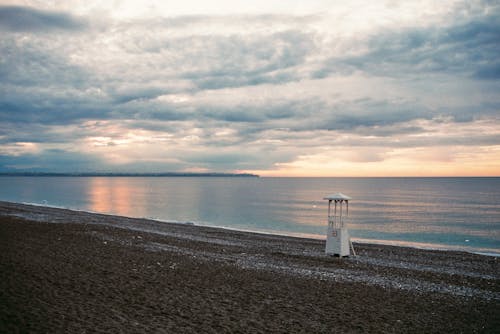 Cloudy Sky over Seashore at Dusk