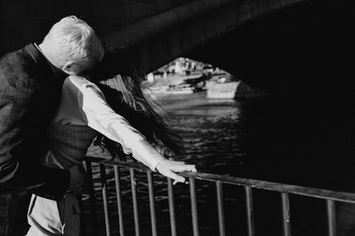 Free A Couple on a Bridge in Black and White Stock Photo