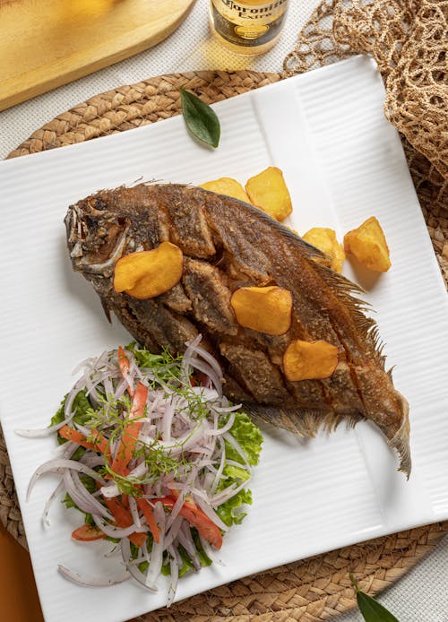 Fried Fish with Salad on Plate
