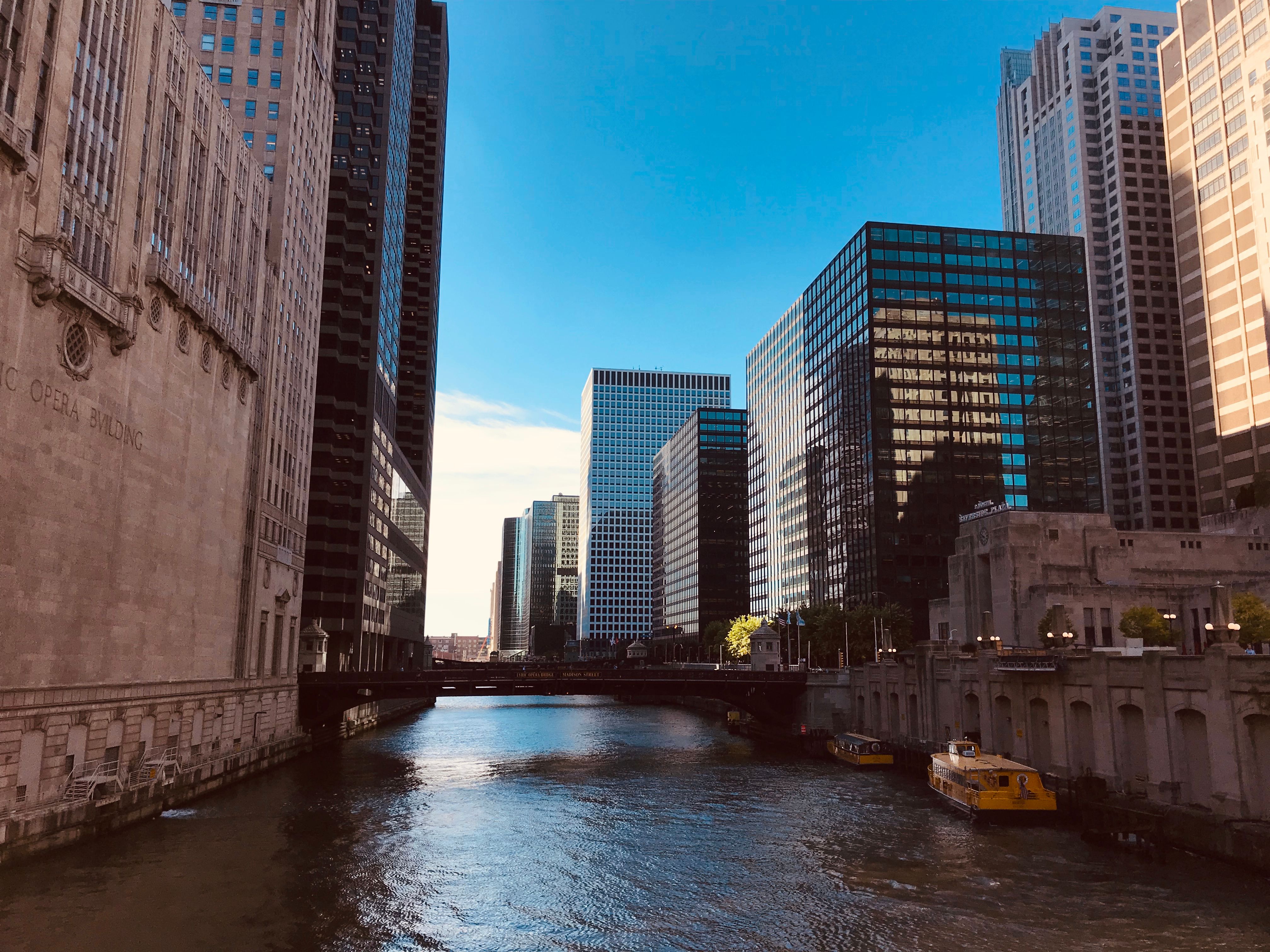 Picture of Boat Docked Near High Rise Buildings · Free Stock Photo