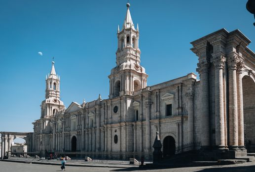 The majestic Basilica Cathedral of Arequipa under a clear blue sky, showcasing its classic architecture.