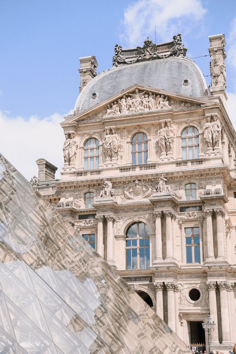 Close Up Of Louvre Pyramid And Building