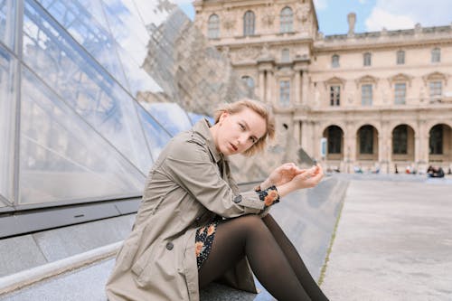 Blonde Woman Sitting at Louvre
