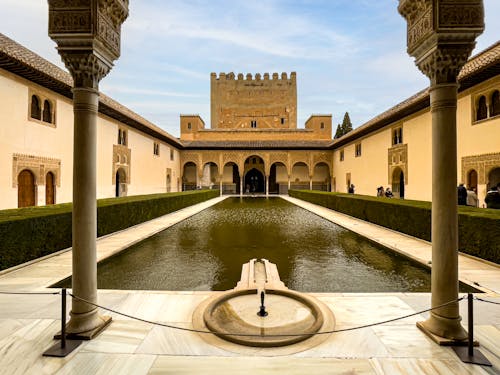 The pool of the Court of the Myrtles, Alhambra Palace Complex in Granada, Spain
