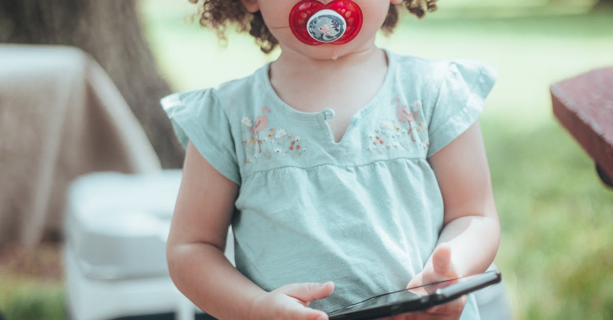 Child with Pacifier · Free Stock Photo