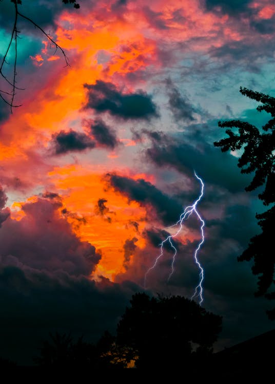 Lightning During Golden Hour · Free Stock Photo