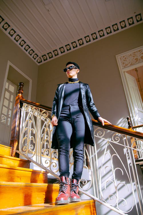 Woman Posing on Stairs with Sunglasses