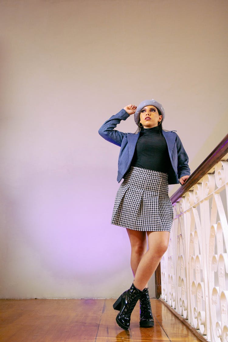 Young Woman Wearing An Elegant Outfit With A Beret And Heels