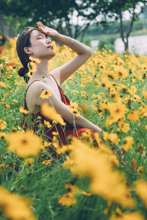 Woman Sitting in the Meadow 