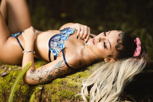 Woman Lying Down and Posing in Bikini