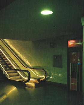 A dimly lit escalator in a Porto metro station, capturing a mysterious and cinematic ambiance.