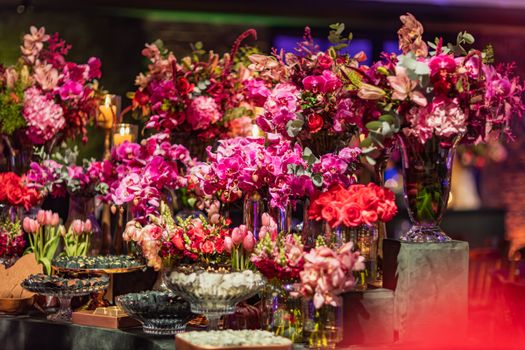 Colorful floral arrangements create a stunning centerpiece for celebratory events.