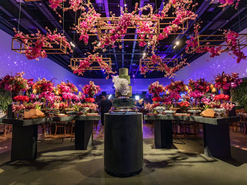 Lavish venue interior with vibrant floral decorations