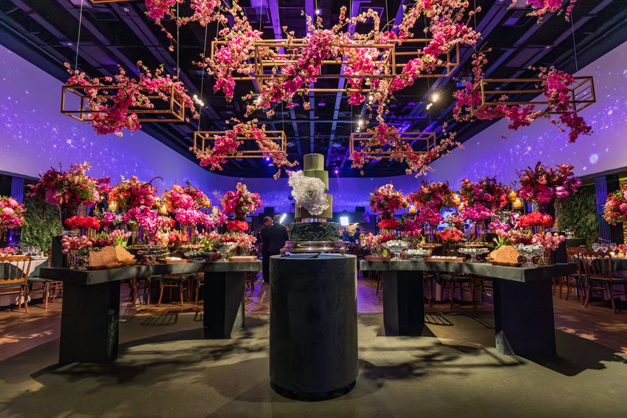 Lavish venue interior with vibrant floral decorations