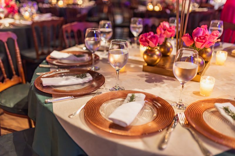Table with roses and candles for an engagement celebration